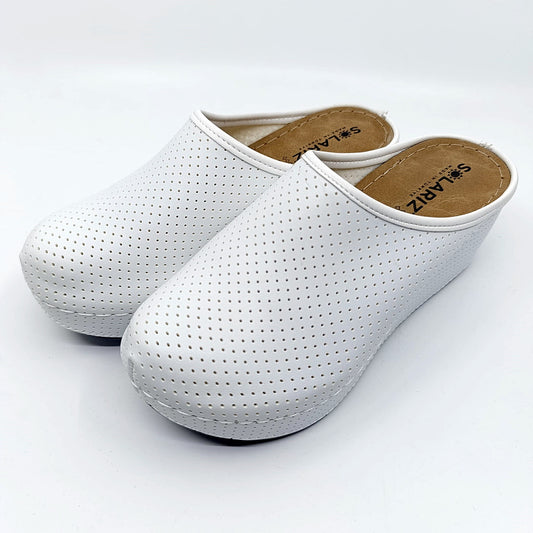 bijele klompe sa povisenim dzonom