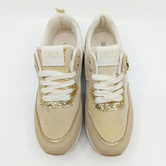 zlatne šljokice na tenesicama