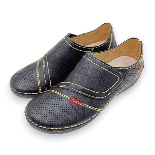 zenske cipele hodalice crne perforirane cicak traka bocni pogled